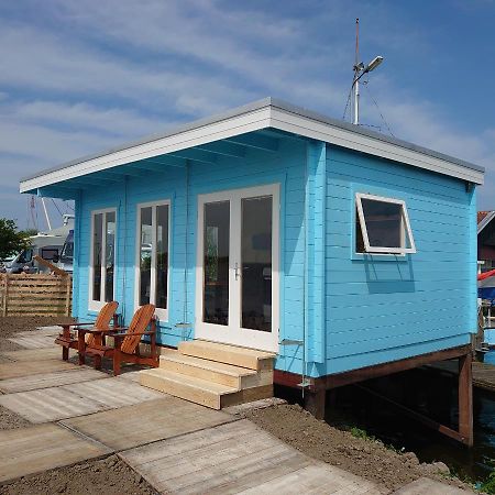 Waterhuisjes Op De Pier Van Lauwersmeerplezier! Lauwersoog Exterior foto