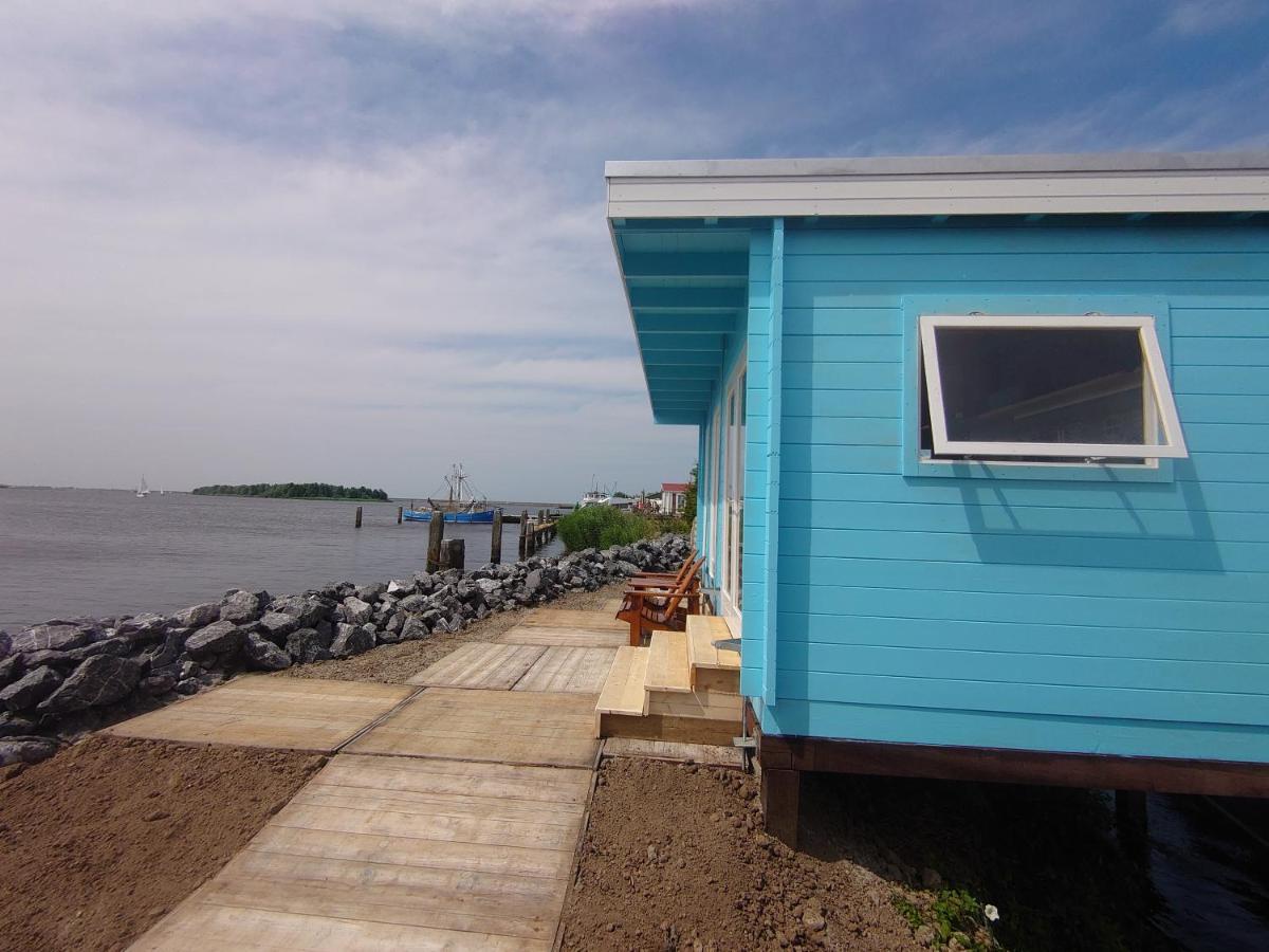 Waterhuisjes Op De Pier Van Lauwersmeerplezier! Lauwersoog Exterior foto