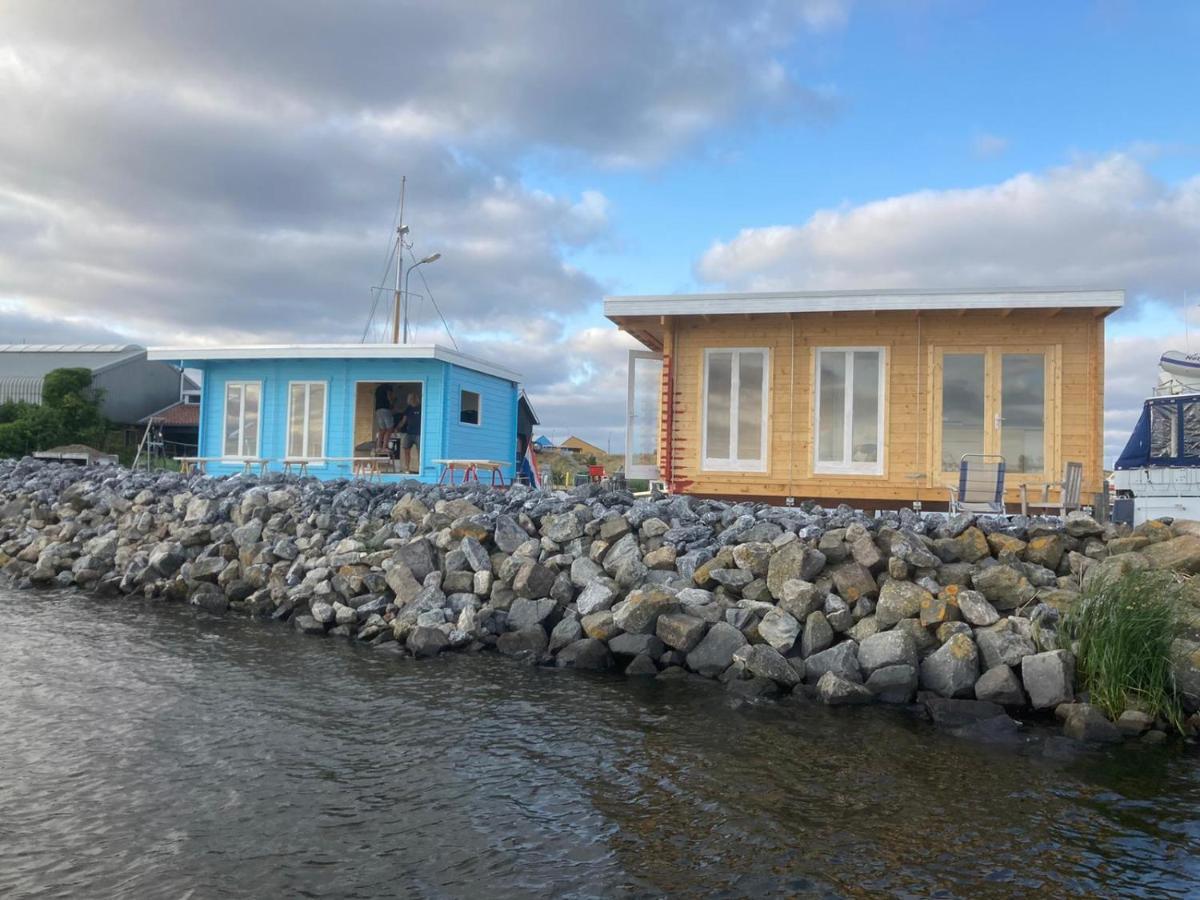 Waterhuisjes Op De Pier Van Lauwersmeerplezier! Lauwersoog Exterior foto