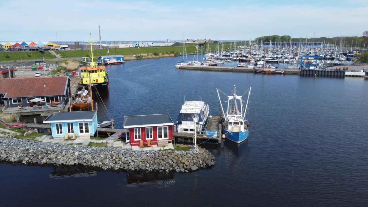 Waterhuisjes Op De Pier Van Lauwersmeerplezier! Lauwersoog Exterior foto